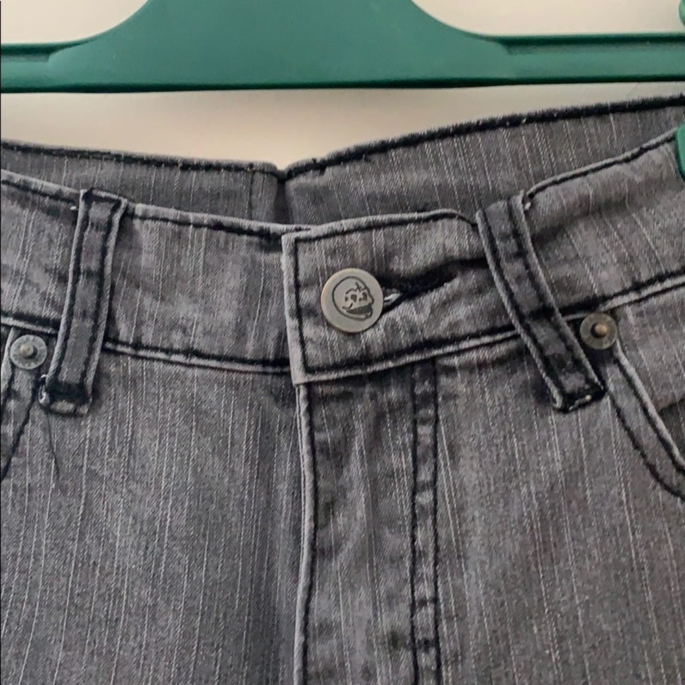 Used gray washed jeans